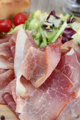 slice of dry ham on a cutting board