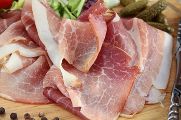 slice of dry ham on a cutting board