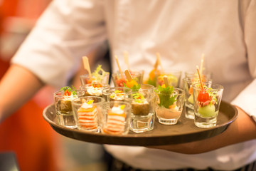 Food Buffet Catering Dining Eating Party Sharing Concept.people group catering buffet food indoor in luxury restaurant with meat colorful fruits and vegetables
