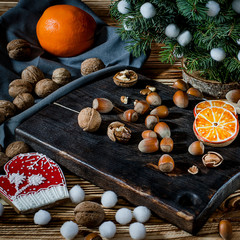 Tree, Orange, orange slices and biscuits snowflakes lie on the wood table