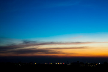 Twilight sky background. Colorful Sunset sky and cloud.vivid sky in twilight time background.Fiery orange sunset sky. Beautiful