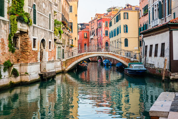 Fototapeta na wymiar Traditional canal street in Venice, Italy