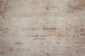 Background with textured old limestone wall