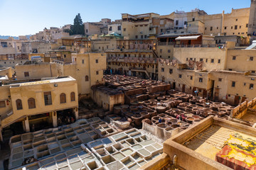 Panorama of Chouara tannery in old medina in Fes, a traditional and old tannery with workers...