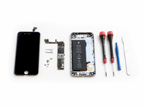 Repair broken smartphone on white background