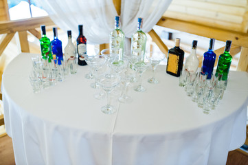 Dessert table of cocktails beverages on wedding reception.