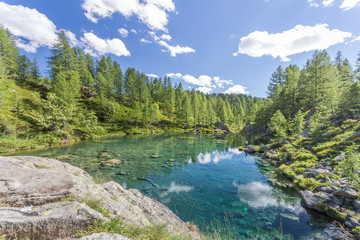 The small lake near Crampiolo known as the Lago delle Streghe, Alpe Devero, Antigorio valley, Piedmont, Italy