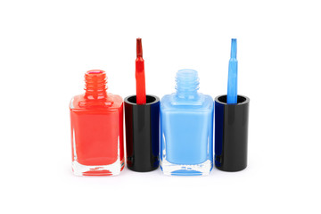 Bottles with nail polish on a white background