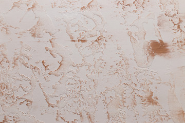 Cement putty painted wall with cracks as a background