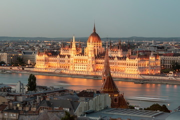 Fototapeta premium Awesome view of Budapest Parliament illuminated at sunset