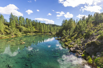 Fototapeta na wymiar The small lake near Crampiolo known as the Lago delle Streghe, Alpe Devero, Antigorio valley, Piedmont, Italy