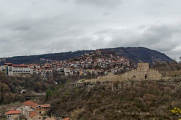 Fototapeta na wymiar Springtime panorama of a ruins of Trapezitsa, medieval stronghold located on a hill with the same name in Veliko Tarnovo, Bulgaria, Europe 