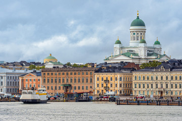 Helsinki. Finland. Liner in the cruise port of Helsinki. Houses on the waterfront in Helsinki....