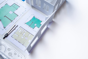 Work on the project premises. Drawing supplies, building plan and layout of the apartment on a...