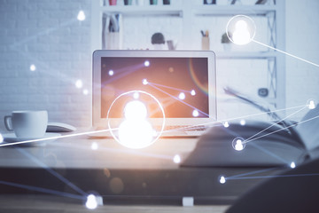 Obraz premium Computer on desktop with social network theme icon. Multi exposure. Concept of international connections.