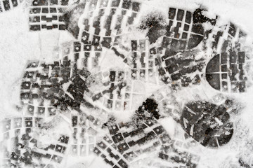 Fototapeta na wymiar Shoeprints in snow