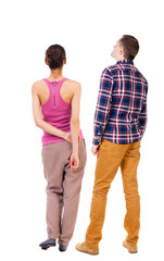 Back view of couple. beautiful friendly girl and guy together.