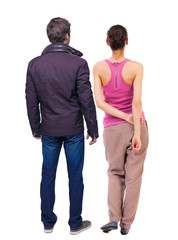 Back view of couple. beautiful friendly girl and guy together.