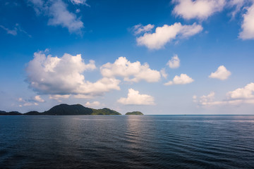 Fototapeta na wymiar Sea and island with the rain cloud background