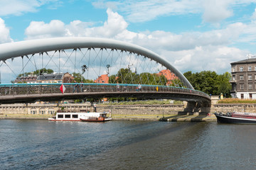 Krakow, Poland/Europe; 09/07/2019: Father Bernatek bridge (Lover's Bridge) over the Vistula river in Krakow