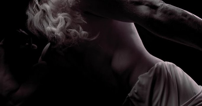 Low angle view on a living statue of a greek God, with muscular body, 4k