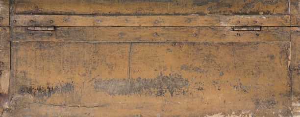 vintage texture of an old yellowed wooden brown background