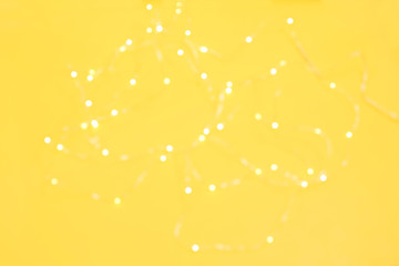 Obraz na płótnie Canvas Background of defocussed golden festive lights. Christmas time