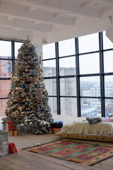 Christmas bedroom interior, Christmas tree by the bed