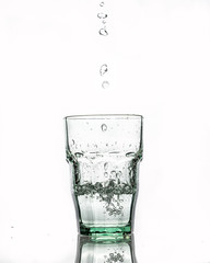 in glass transparent the glass pours clean water