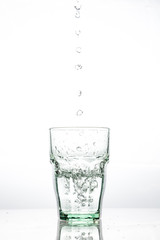 in glass transparent the glass pours clean water