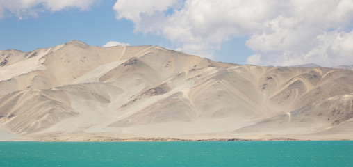 Tashkurgan, China - located 3.500m above the sea level, along the road between Kashgar and Tashkurgan, the Baisha Lake offers some amazing sights and colors 