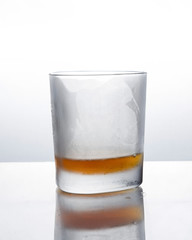 A frozen glass tumbler and strong alcohol.