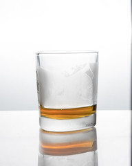 A frozen glass tumbler and strong alcohol.