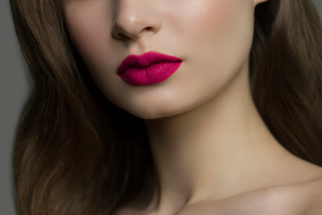 Sexual full lips. Natural gloss of lips and woman's skin. The mouth is closed. Increase in lips,...