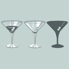 two transparent wide cocktail glasses for wine with olives on a skewer inside in gray tones for wine, one empty and the other with a drink inside, and the same silhouette