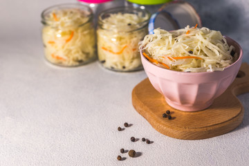  fermented sauerkraut village vegan salad in a glass jar. healthy product. rustic food. Probiotics concept.