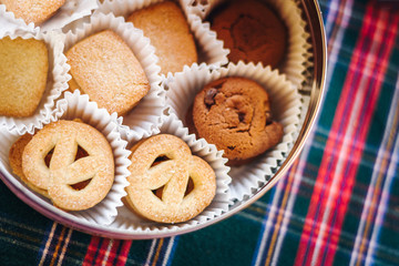 Variety of biscuits in a box.  Christmas cookies
