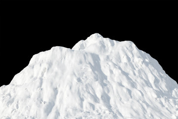 Fototapeta na wymiar White snow heaped in a pile on a black background