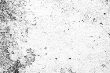 Texture of a concrete wall with cracks and scratches which can be used as a background