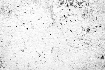 Texture of a concrete wall with cracks and scratches which can be used as a background