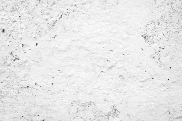 Texture of a concrete wall with cracks and scratches which can be used as a background