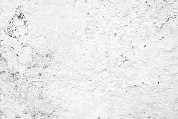 Texture of a concrete wall with cracks and scratches which can be used as a background