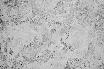 Texture of a concrete wall with cracks and scratches which can be used as a background