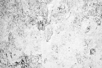 Texture of a concrete wall with cracks and scratches which can be used as a background