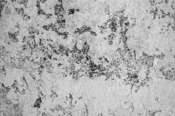 Texture of a concrete wall with cracks and scratches which can be used as a background