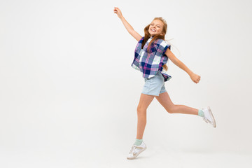 happy european girl jumping on a white background