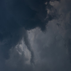 heavy storm cloud on dramatic moody dark sky