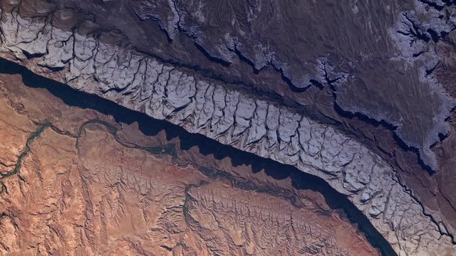 Comb Ridge scenic mountains aerial satellite view sunrise animation. Contains public domain image by Nasa