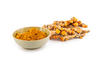 fresh turmeric root and turmeric powder in spoon on white background