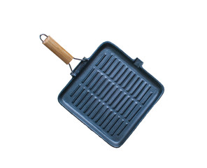 Isolated cast iron grill pan on a white background. Black empty grill pan top view.